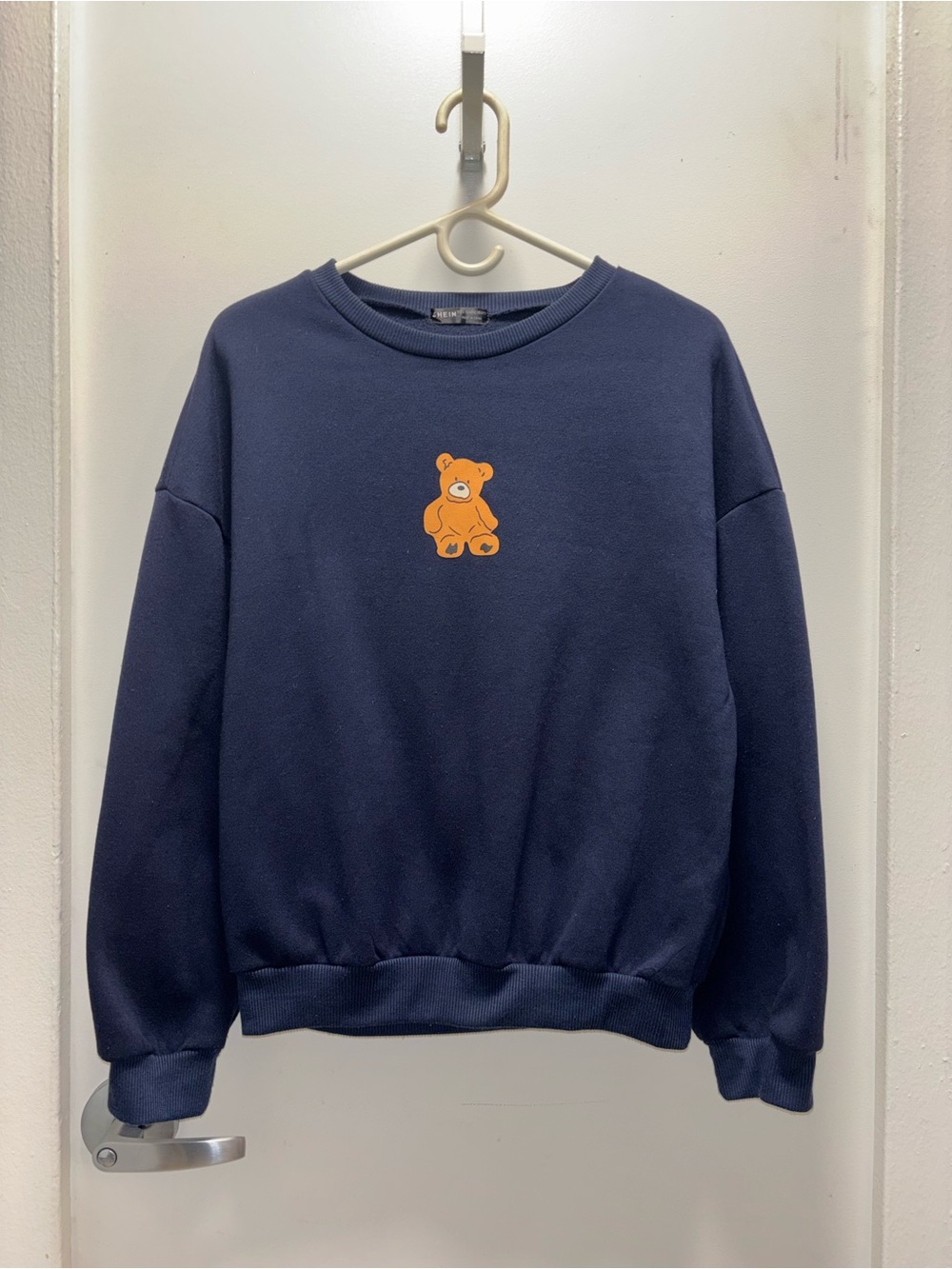 SHEIN Navy Crewneck Sweater with Orange Teddy Motif